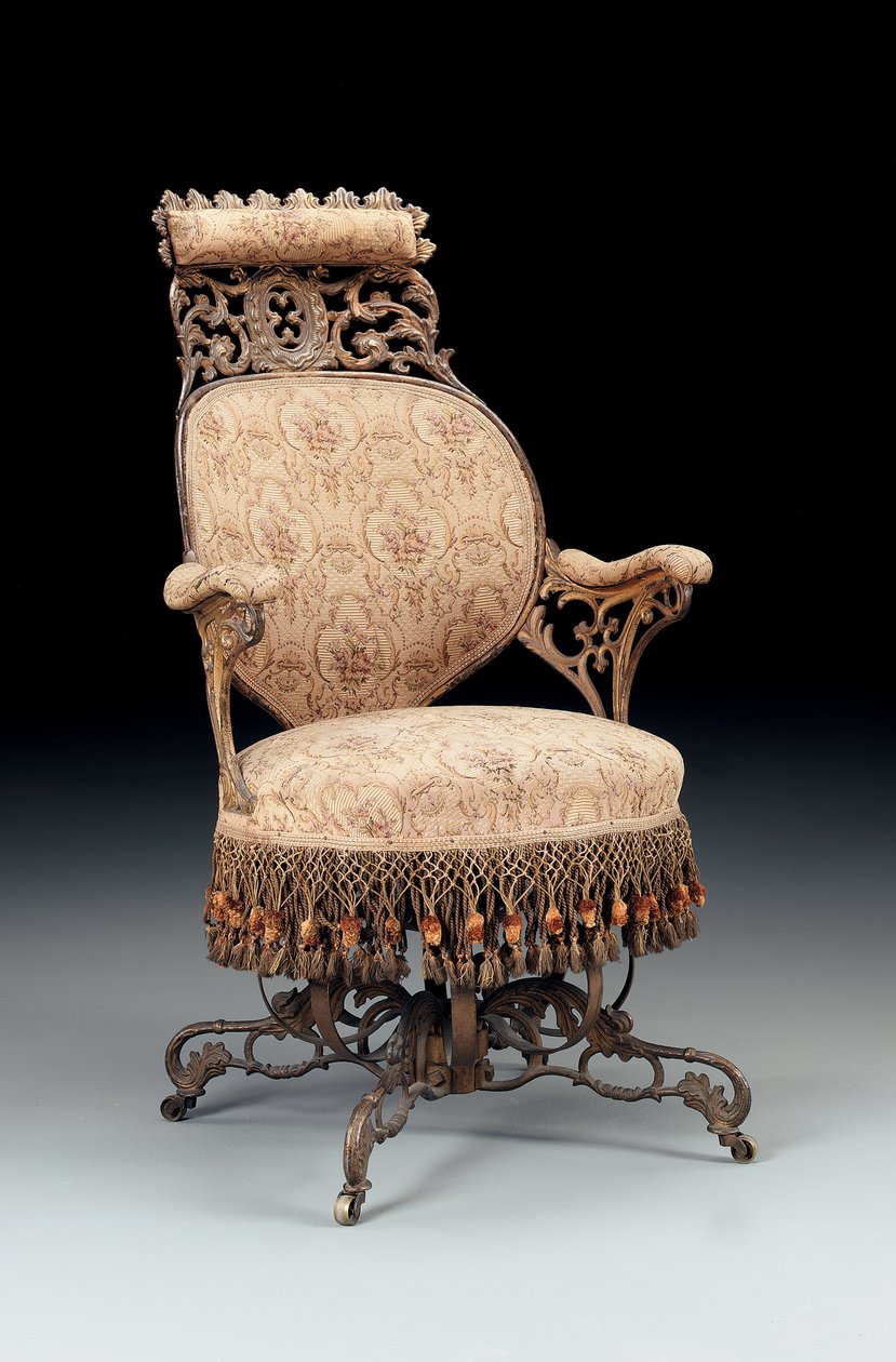 रोकोको रिवाइवल ने अमेरिकी चेयर कंपनी, न्यूयॉर्क, c.1850 द्वारा निर्मित, कच्चा लोहा-केंद्रित सेंट्रिपेटल आर्मचेयर पेंट और गिल्ड किया। द्वारा अमेरिकी स्कूल