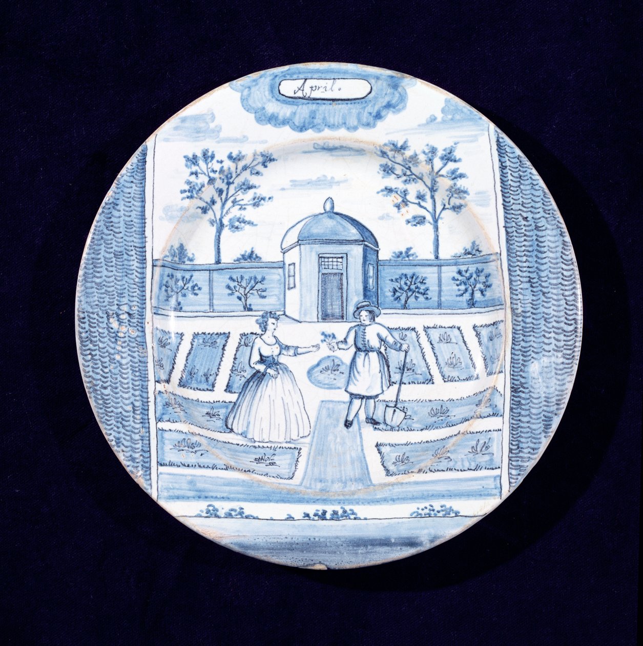 Delftware अप्रैल के महीने को दर्शाती प्लेट (टिन-चमकता हुआ मिट्टी के बरतन) द्वारा डच स्कूल