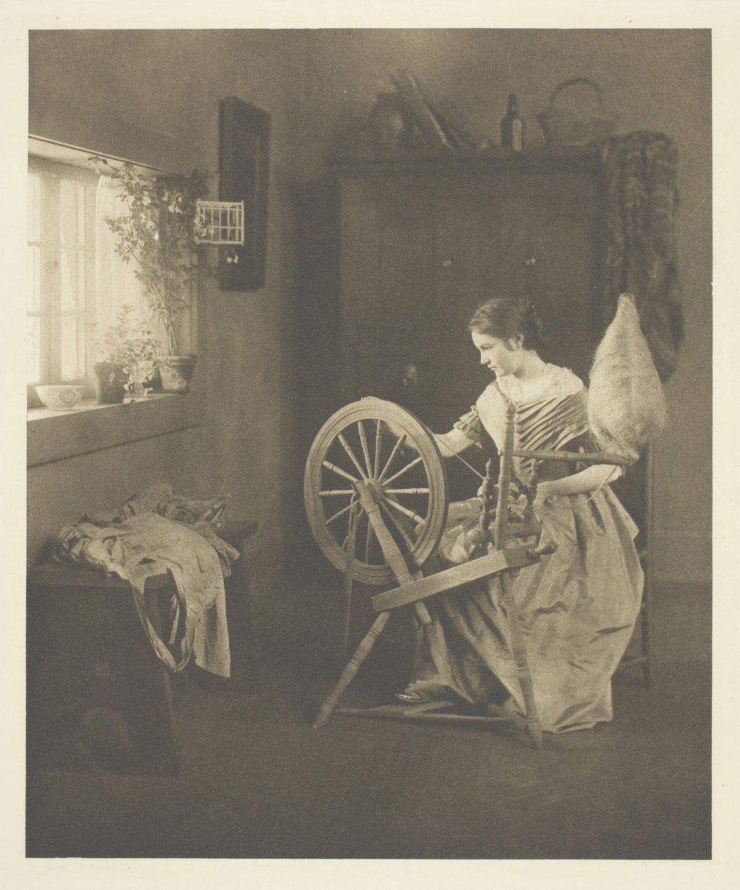 स्पिनिंग, सी। 1898. द्वारा एमिली वी. क्लार्कसन