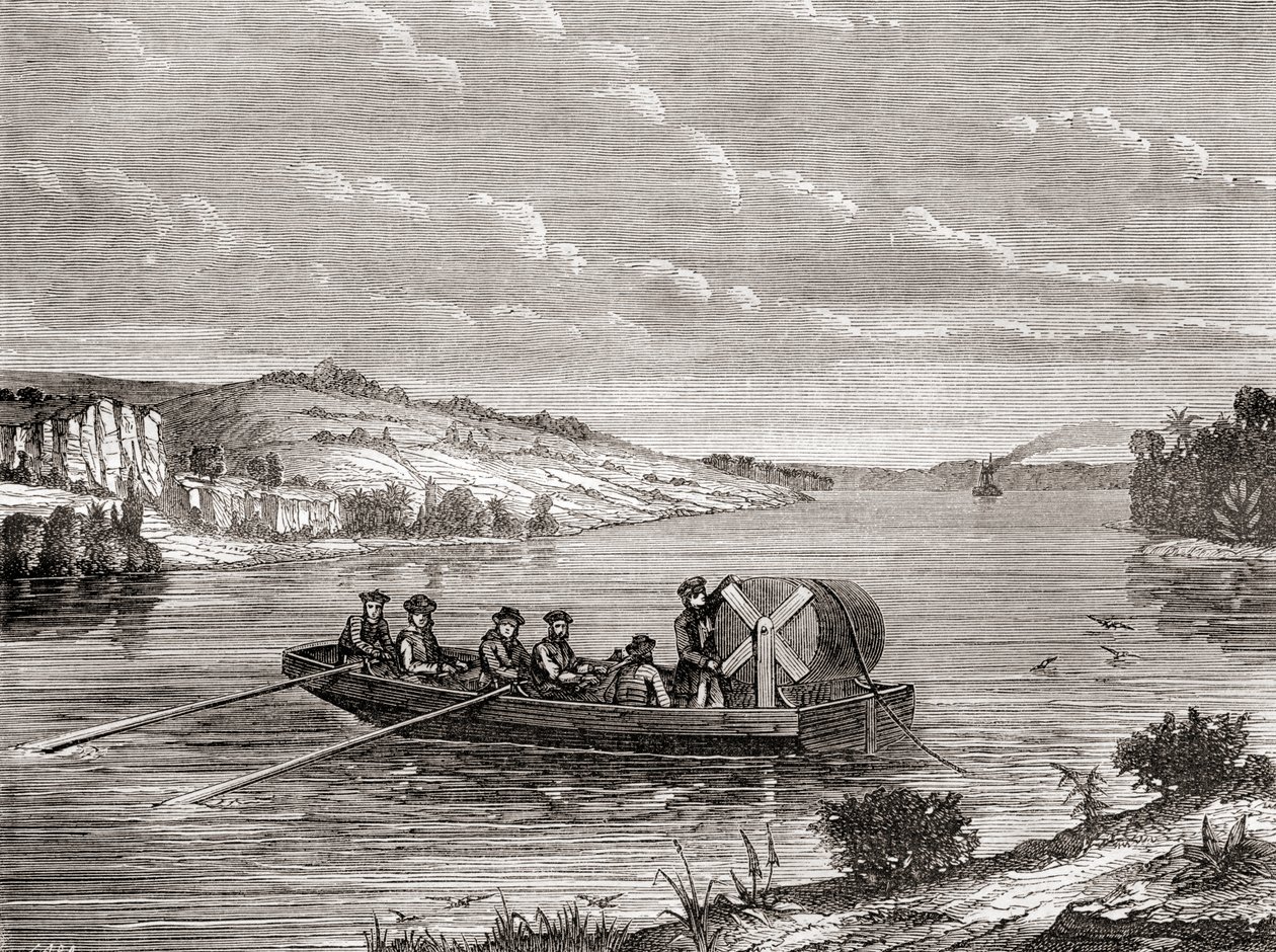 एक अमेरिकी नदी के नीचे एक टेलीग्राफ केबल बिछाना c.1860, Les Merveilles de la Science से प्रकाशित c.1870 (उत्कीर्णन) द्वारा फ्रेंच स्कूल