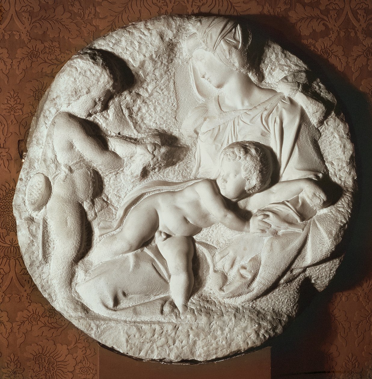 टोंडो तादेई, माइकल एंजेलो बुओनारोती (1475-1564) द्वारा गोलाकार पत्थर की मूर्तिकला द्वारा माइकल एंजेलो बुओनारोती