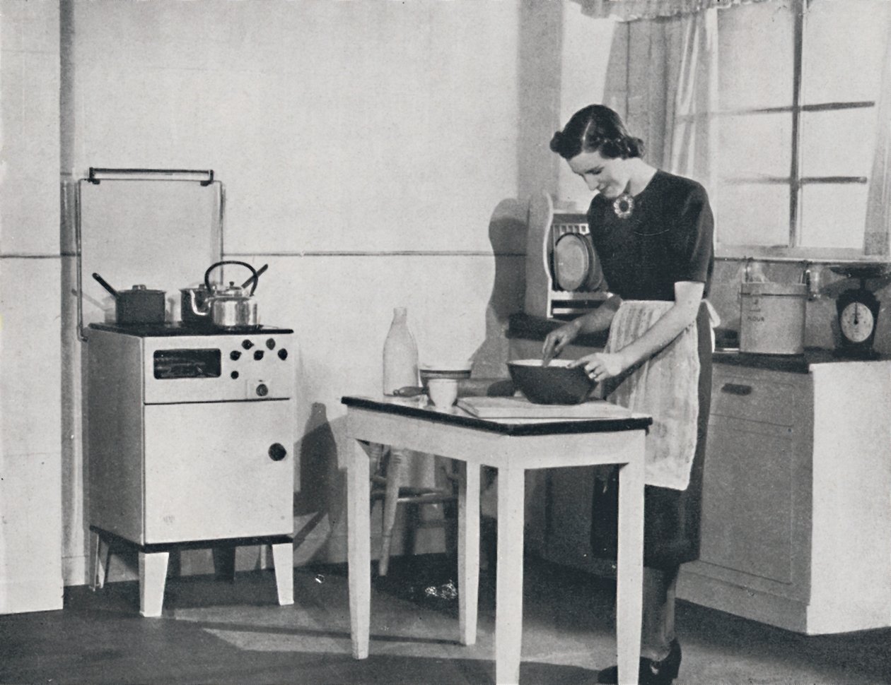एक ब्रिटिश रसोई एक कैबिनेट गैस कुकर, 1942 से सुसज्जित है। द्वारा अज्ञात