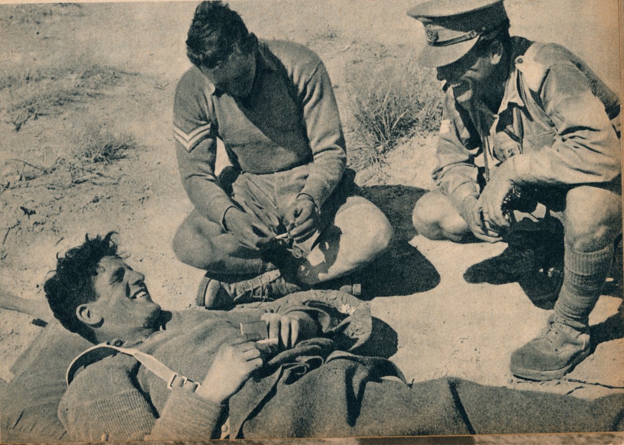 एक घायल एंटी टैंक गनर के साथ एम्बुलेंस पुरुष, c1942 1944 द्वारा अज्ञात