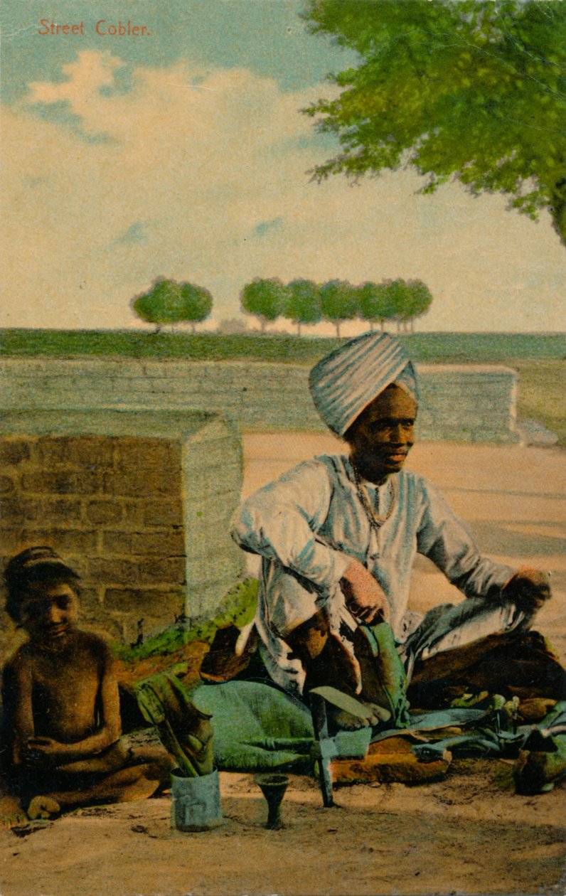 स्ट्रीट कोबलर, c1900 द्वारा अज्ञात