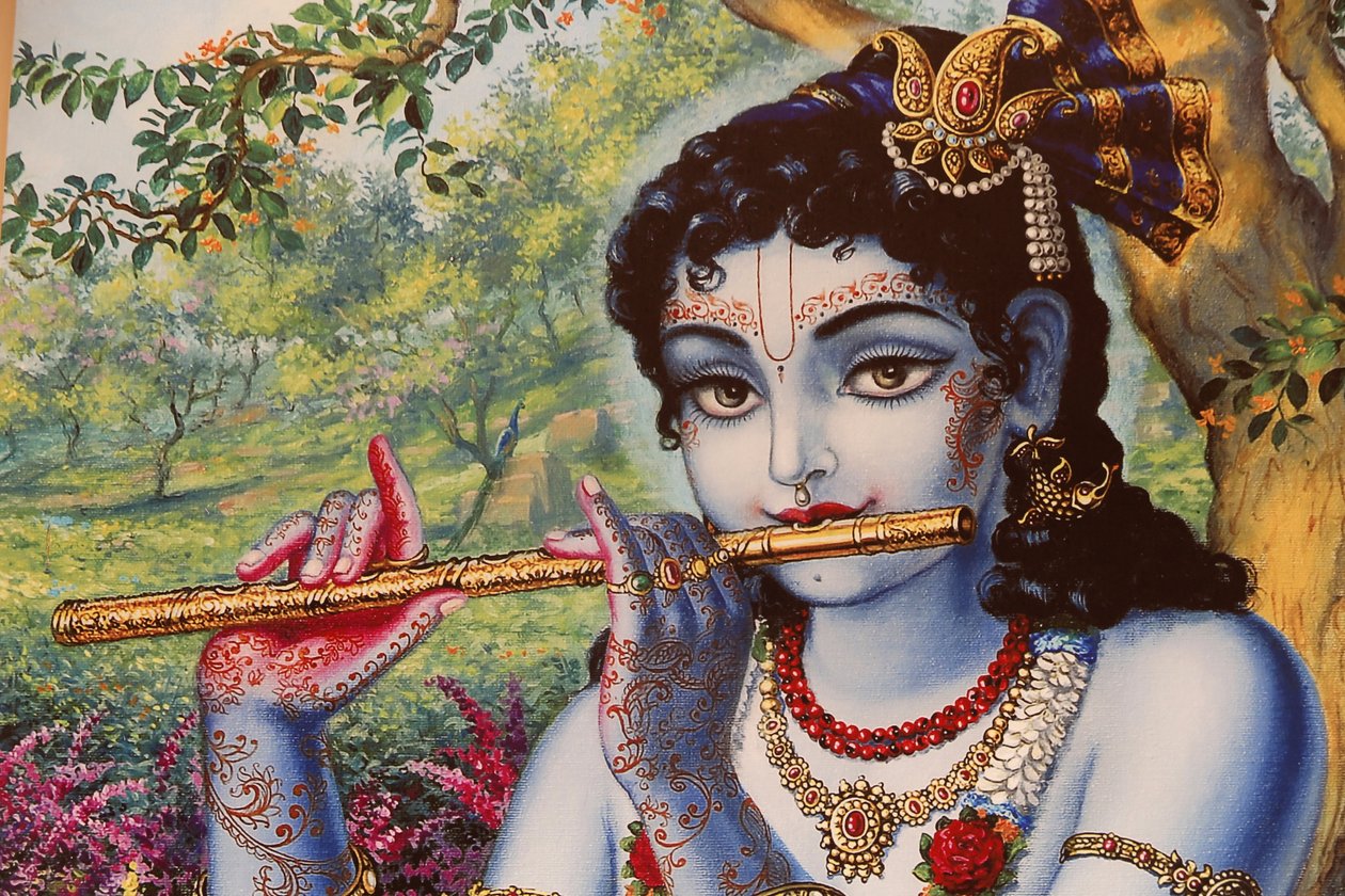 हिंदू भगवान कृष्ण को बाहर बांसुरी बजाते हुए चित्रित किया गया चित्र। भारत द्वारा अज्ञात