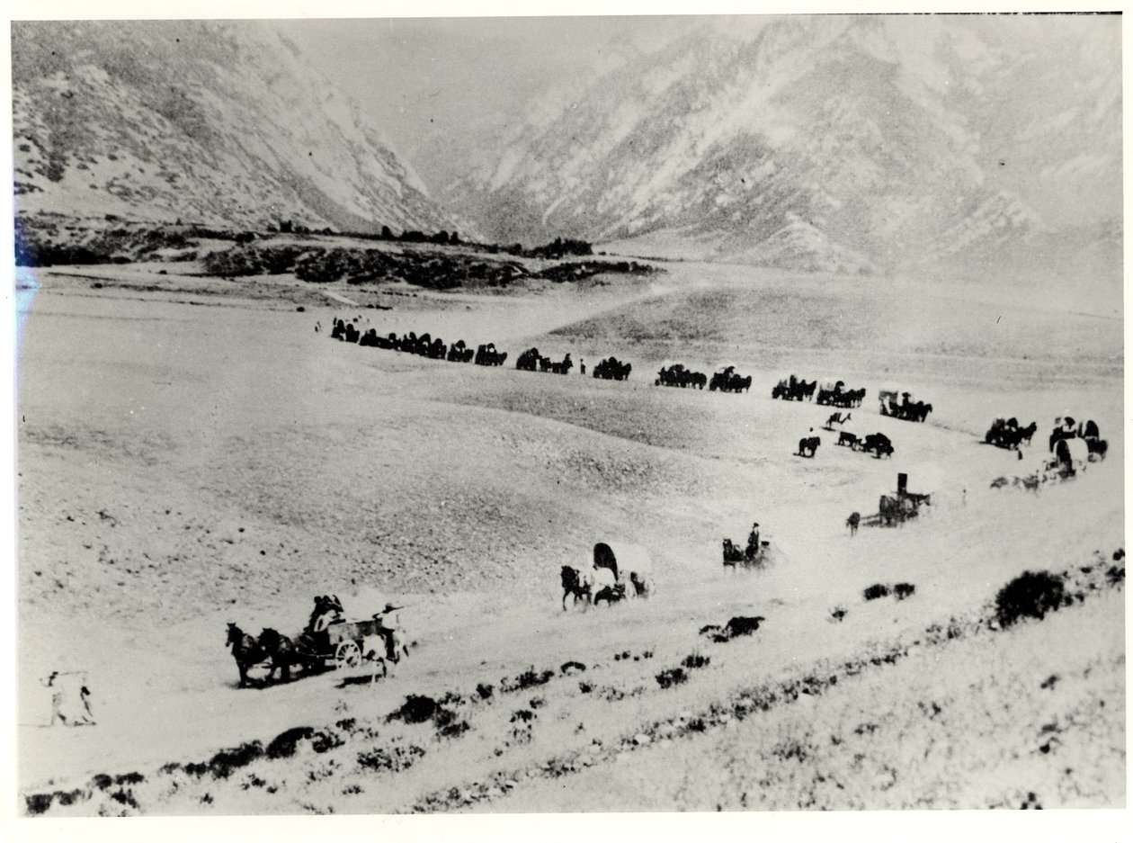 पायनियर्स ट्रेन स्टेशन से आप्रवासियों को इकट्ठा करते हैं और उन्हें मॉर्मन सॉल्ट लेक सिटी तक ले जाते हैं द्वारा विलियम हेनरी जैक्सन
