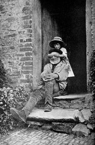 इंग्लैंड में अपने दादा के साथ एक बच्चा, c1922।