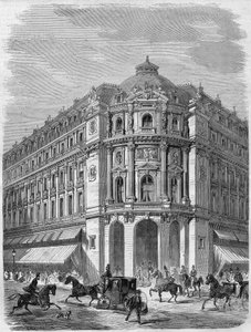 1867 से 1869 में निर्मित ऑगस्टे मैग्ने की योजनाओं के आधार पर पेरिस में बुलेवार्ड डेस कैपुसीन और रुए डे ला चौसी-डी'एंटिन के कोने पर वाडेविल के नए थिएटर के अग्रभाग की परियोजना। मोरिन द्वारा एक चित्र के बाद उत्कीर्णन और डेलानॉय। "" L'un . मे