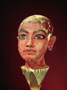 तूतनखामुन के मकबरे से एक कमल के फूल से निकलने वाले बाल राजा का सिर (c.1370-1352 ई.पू.) न्यू किंगडम (प्लास्टर और चित्रित लकड़ी) (149406 भी देखें)