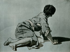 जमीन पर बैठे लड़के का अध्ययन
