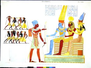 एक फिरौन, सैन्य पोशाक में, देवताओं को कैदियों का एक समूह प्रदान करता है (एल से आर) आमोन, खोंसू और मुट