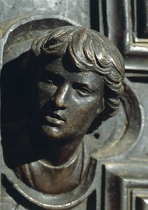 गिउलिआनो डी मेडिसी के प्रमुख, लुका डेला रोबिया (1400-1481) द्वारा दरवाजे पर कांस्य के काम से विस्तार। न्यू सैक्रिस्टी, कैथेड्रल ऑफ सांता मारिया डेल फिओर, फ्लोरेंस। इटली द्वारा लुका डेला रोबिया