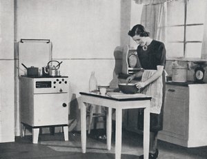 एक ब्रिटिश रसोई एक कैबिनेट गैस कुकर, 1942 से सुसज्जित है। द्वारा अज्ञात