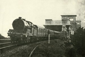 द मेनाई ब्रिज को छोड़ने वाला आयरिश मेल, c1930। द्वारा अज्ञात