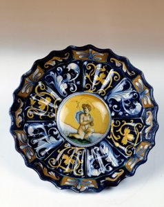 Godronnee faience cup डेकोरी ऑफ़ ए एंजेलोट 16वीं सदी के इगौएन। राष्ट्रीय पुनर्जागरण संग्रहालय द्वारा अज्ञात कलाकार