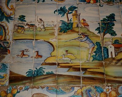 अज़ुलेजोस टाइलें एक शिकारी को हिरण (सिरेमिक) को मारने का चित्रण करती हैं द्वारा स्कूल स्पेनिश