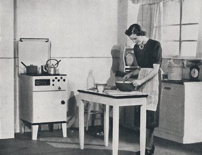 एक ब्रिटिश रसोई एक कैबिनेट गैस कुकर, 1942 से सुसज्जित है। द्वारा अज्ञात