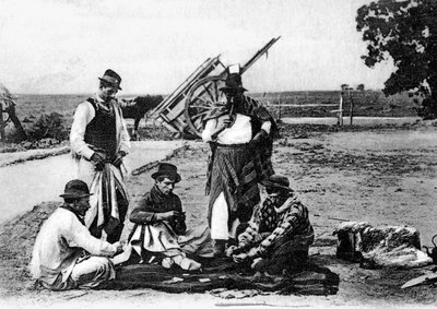 तीन पुरुष ताश खेल रहे हैं, उरुग्वे, c1900s द्वारा अज्ञात