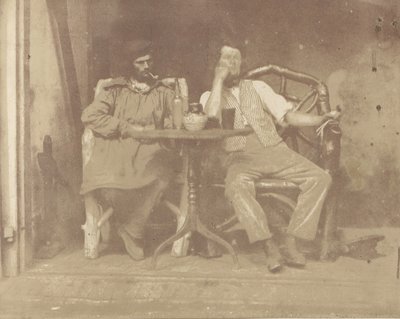 1850 के दशक में एक मेज पर बैठे दो आदमी। द्वारा अज्ञात
