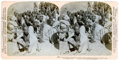 बॉक्सर कैदियों को यूएस 6 वीं कैवलरी, त्सिस्तिन, चीन, 1901 द्वारा पकड़ लिया गया और लाया गया। द्वारा अंडरवुड और अंडरवुड